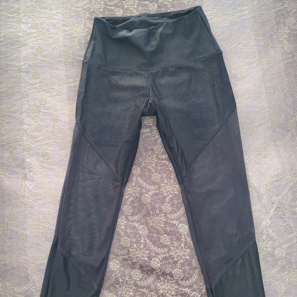 Mesh snakeskin leggings.